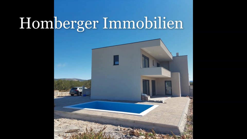 A modern semi-detached house near Šibenik with a swimming pool is waiting for you